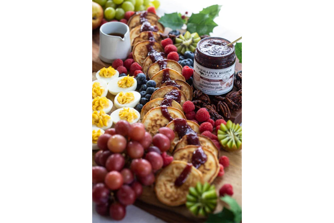 Pancake River with Terrapin Ridge Farms Raspberry Amaretto Jam, Blueberry Bourbon Pecan Jam and Maple Syrup Pancake River with Terrapin Ridge Farms Raspberry Amaretto Jam, Blueberry Bourbon Pecan Jam and Maple Syrup